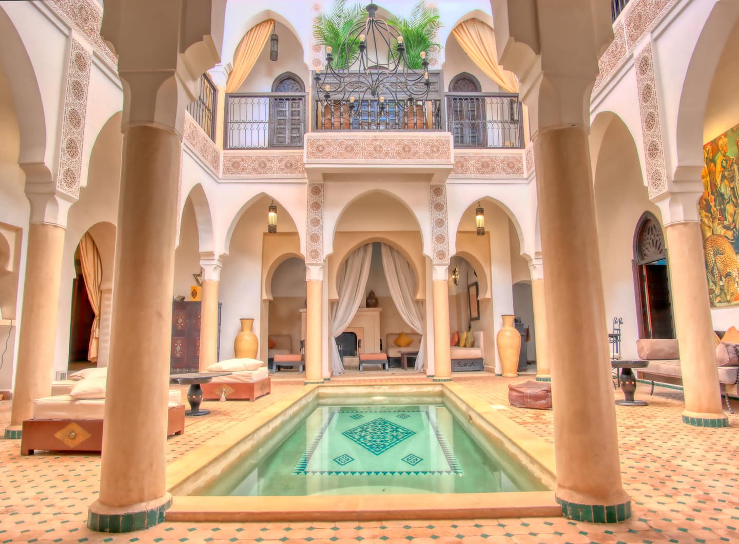 Courtyard pool under the arches of Riad Andalouse